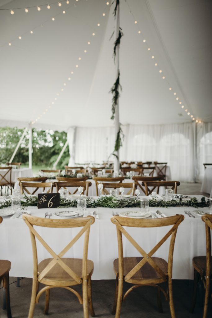 Wedding tablescape inspiration with simple greenery and muted tones